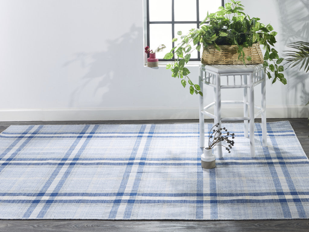 5' X 8' Ivory Blue And Black Abstract Hand Woven Stain Resistant Area Rug