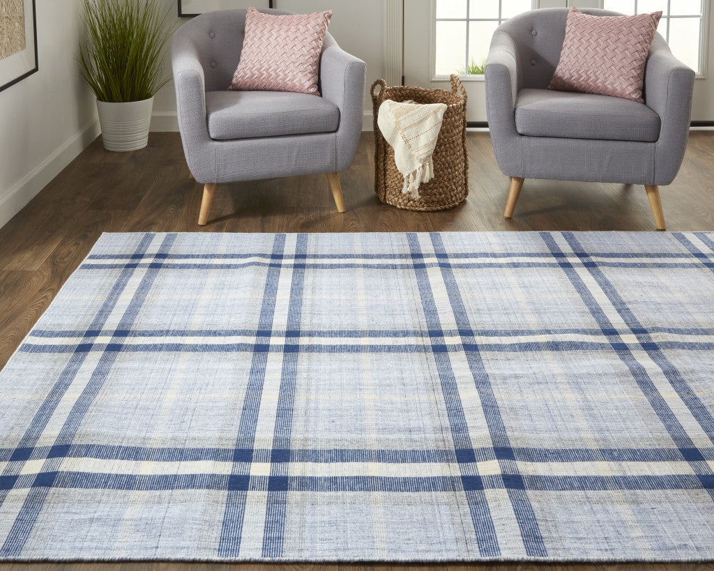 5' X 8' Ivory Blue And Black Abstract Hand Woven Stain Resistant Area Rug