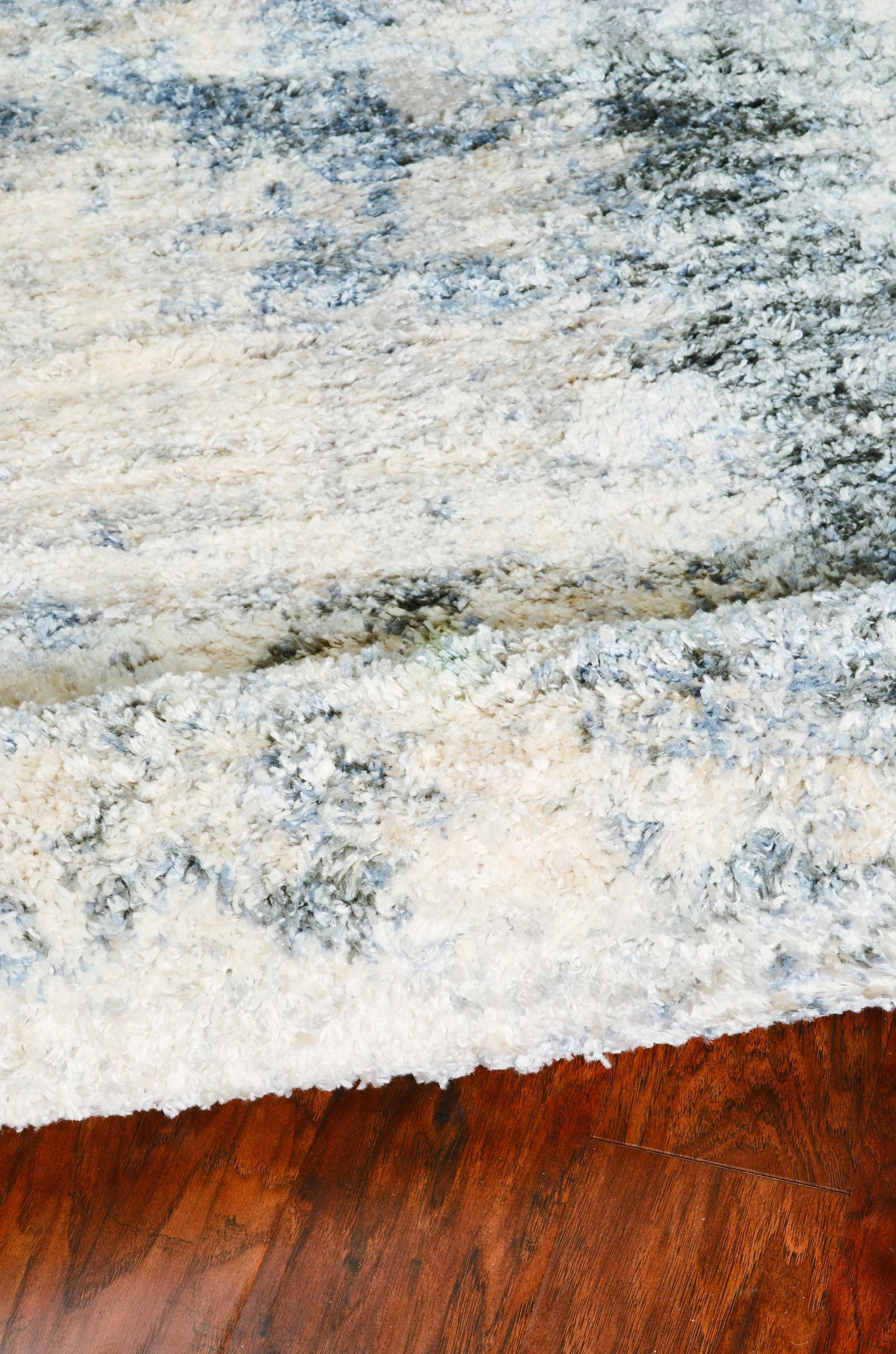 9'X13' Ivory Blue Machine Woven Abstract Indoor Area Rug