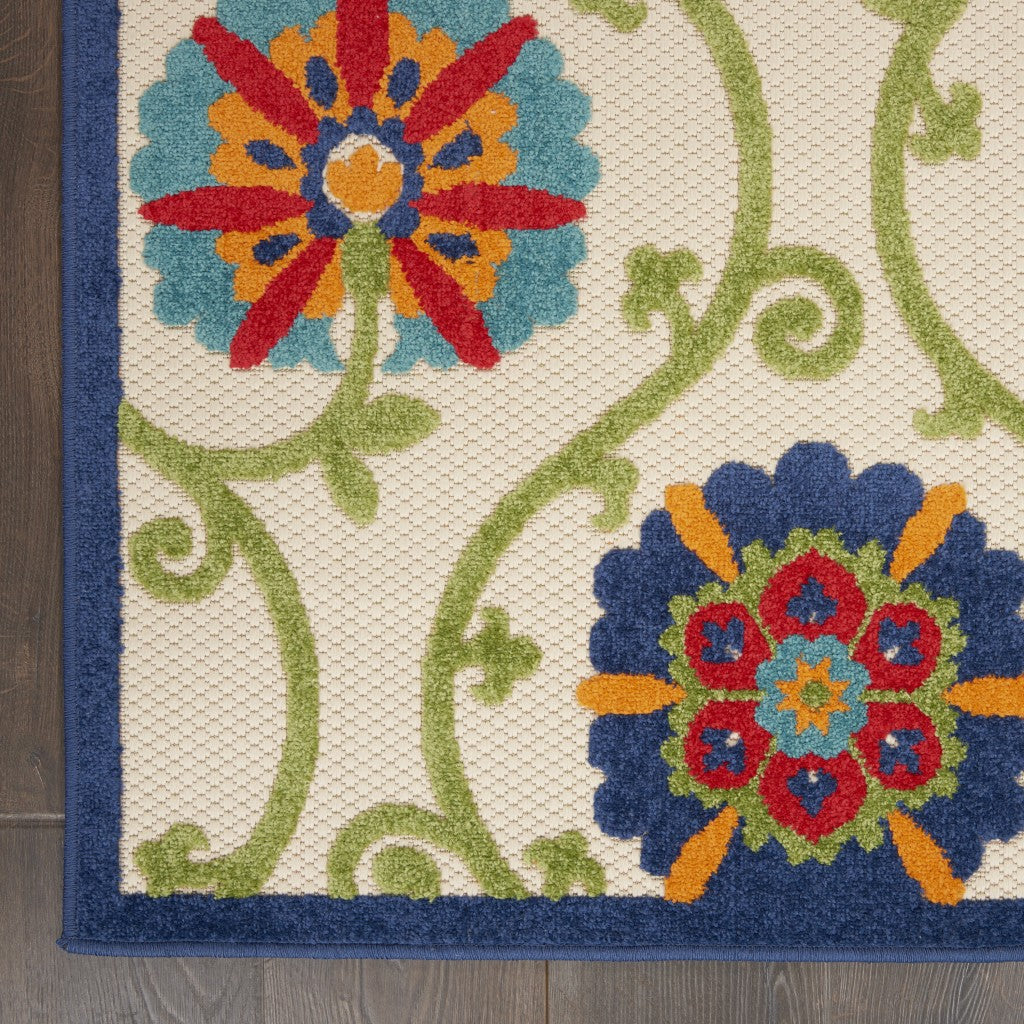2' X 6' Ivory And Blue Floral Indoor Outdoor Area Rug