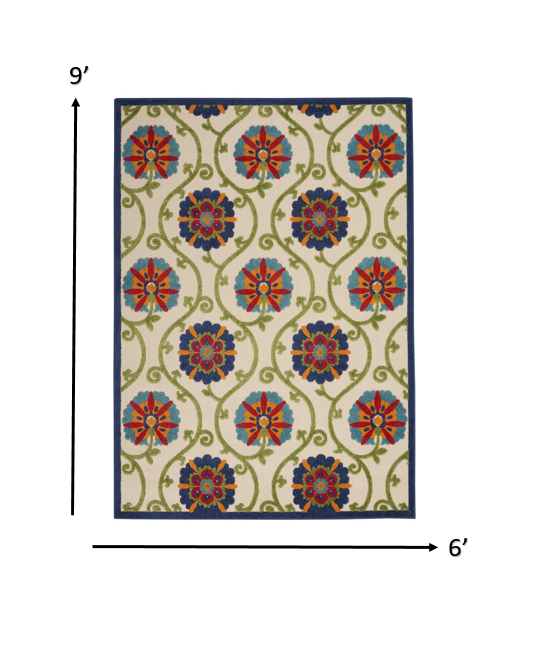 2' X 6' Ivory And Blue Floral Indoor Outdoor Area Rug
