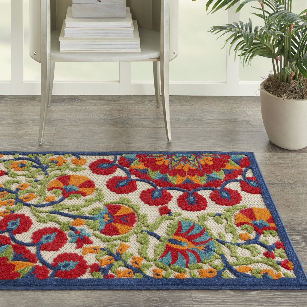 2' X 6' Red And Ivory Floral Indoor Outdoor Area Rug