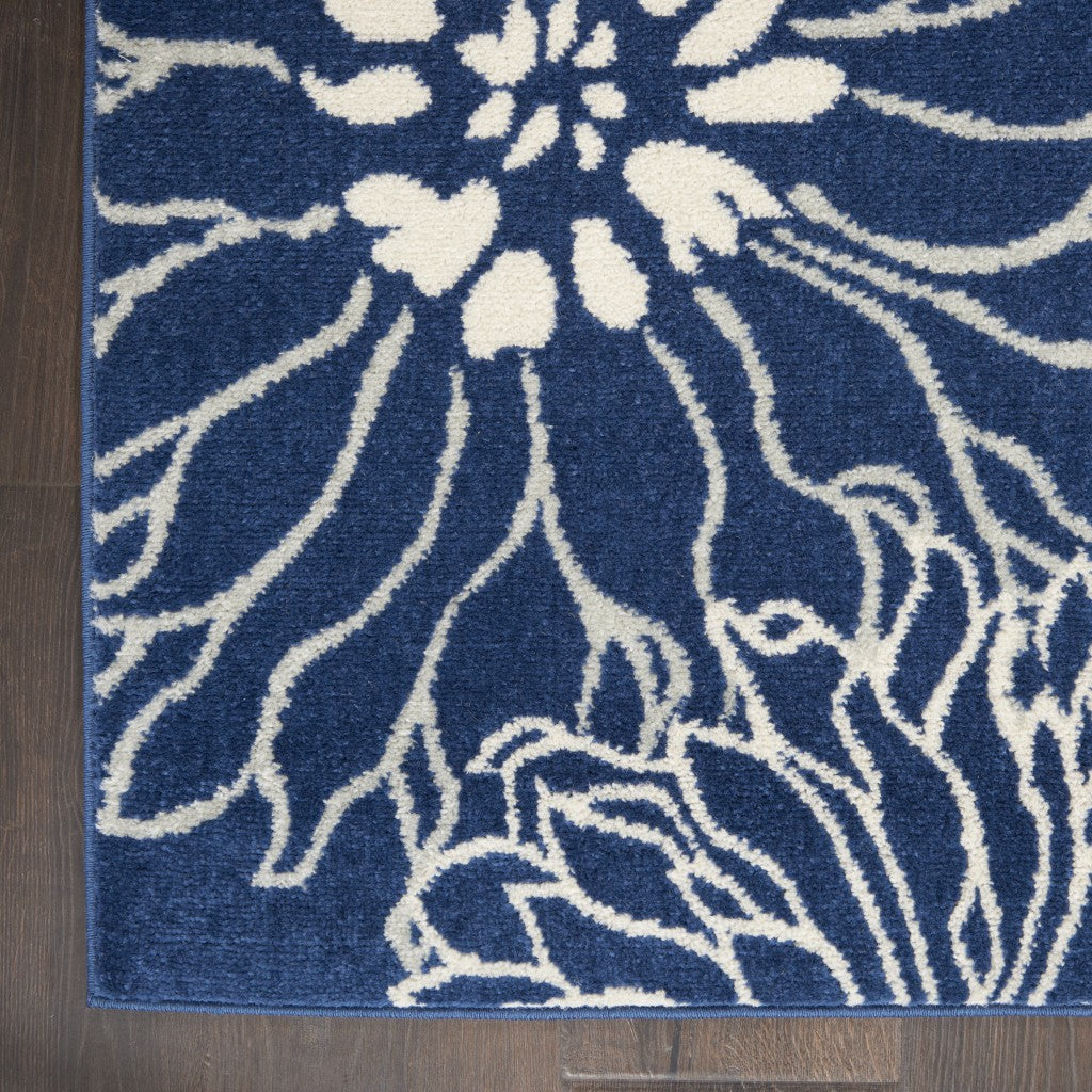 5' Blue And Ivory Round Floral Dhurrie Area Rug