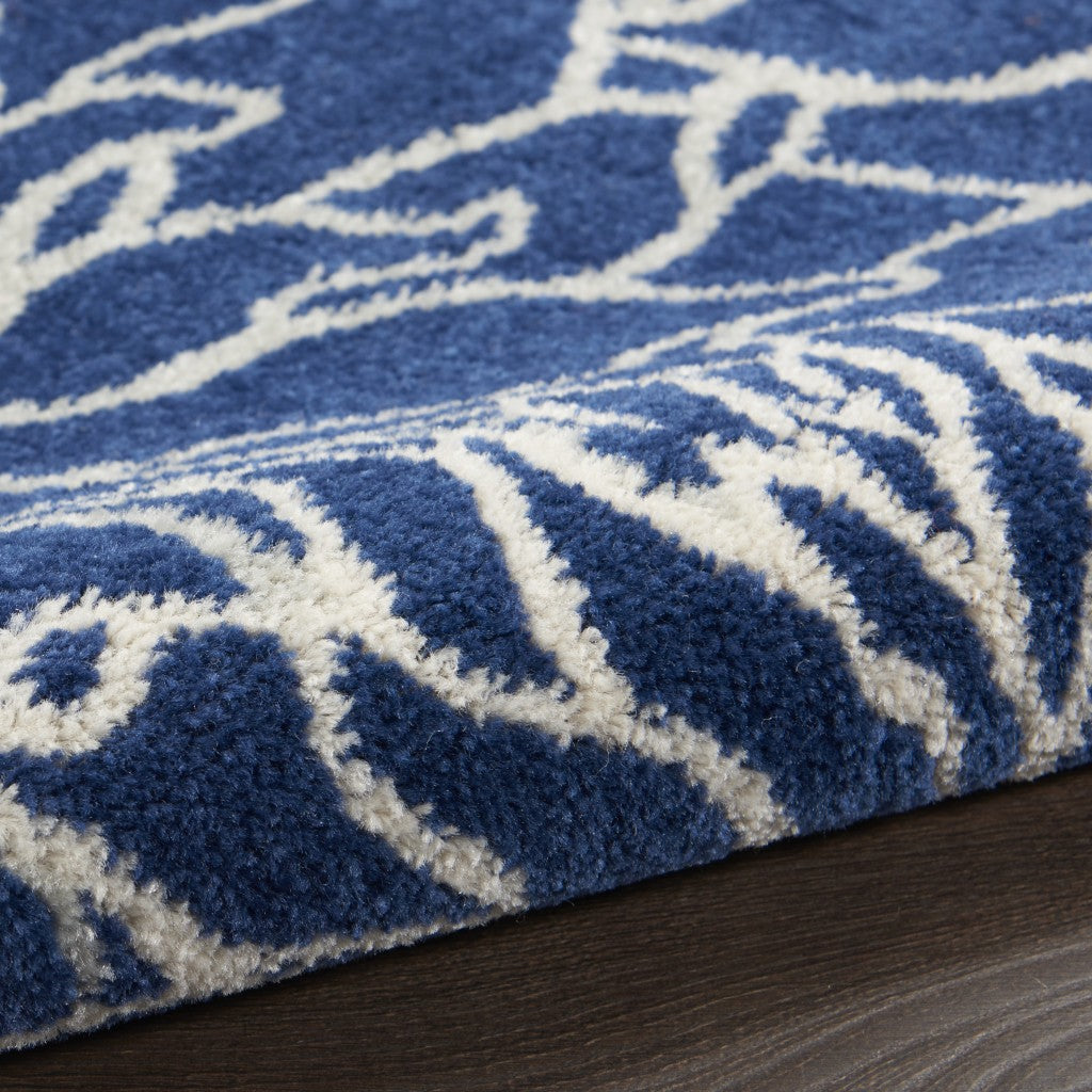 5' Blue And Ivory Round Floral Dhurrie Area Rug