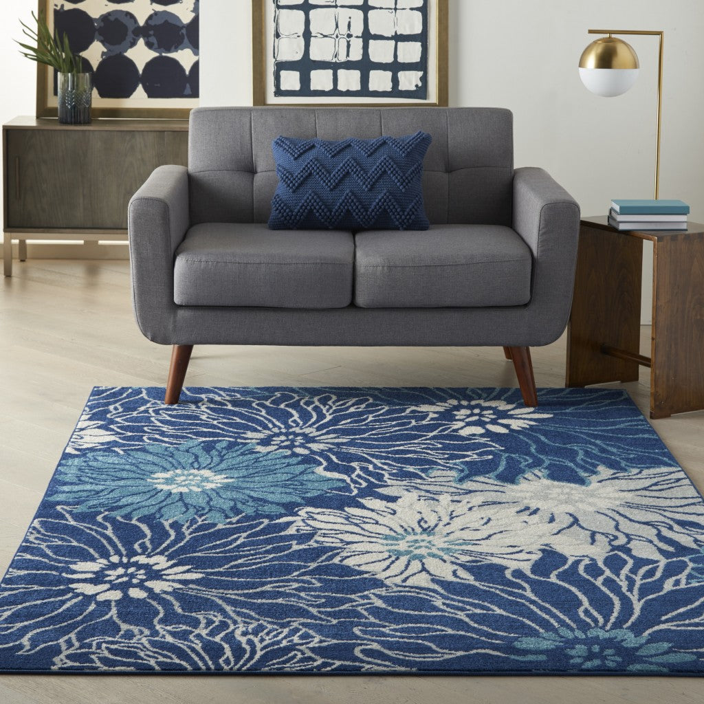5' Blue And Ivory Round Floral Dhurrie Area Rug