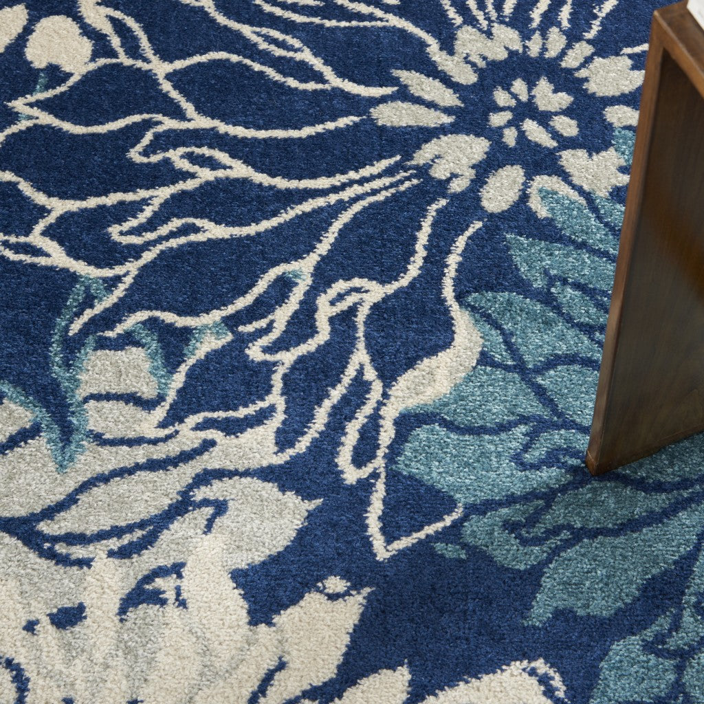 5' Blue And Ivory Round Floral Dhurrie Area Rug