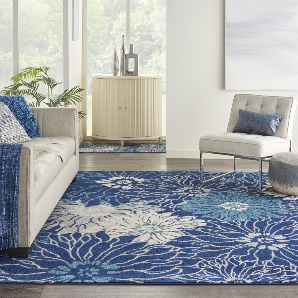 5' Blue And Ivory Round Floral Dhurrie Area Rug