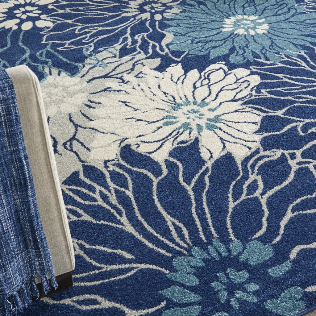 5' Blue And Ivory Round Floral Dhurrie Area Rug