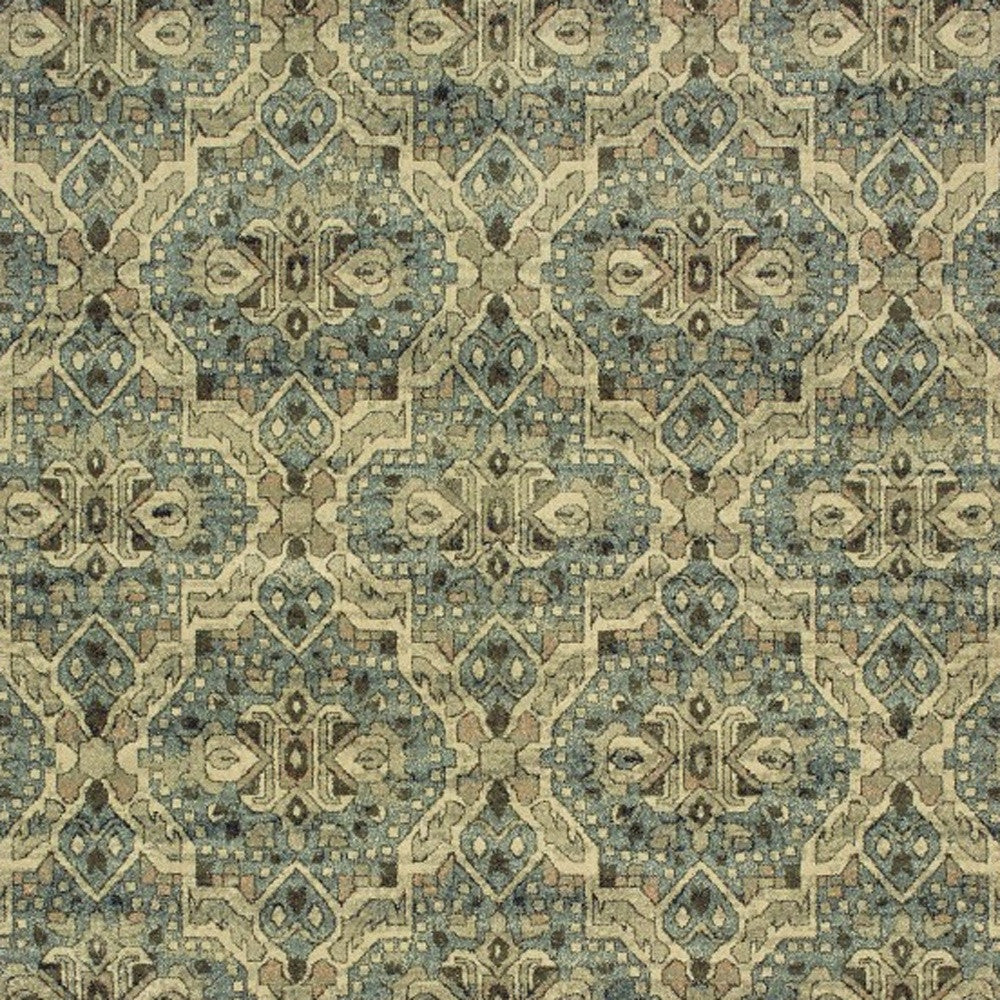 5’X8’ Ivory And Blue Geometric Area Rug