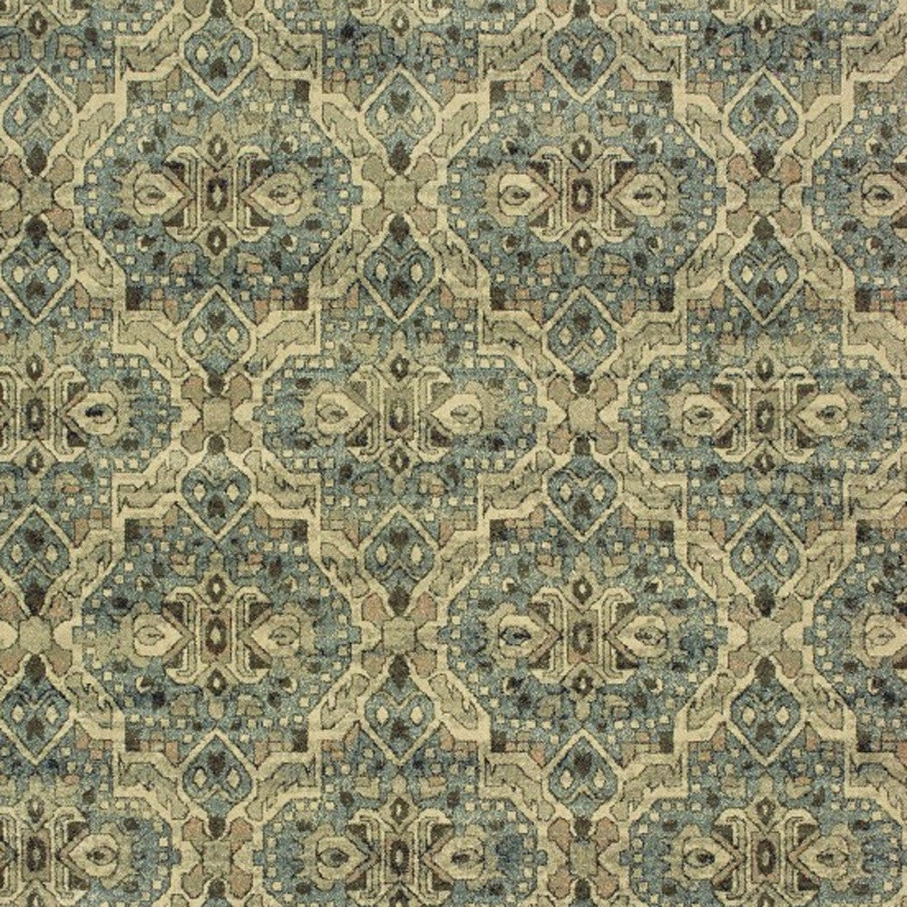5’X8’ Ivory And Blue Geometric Area Rug