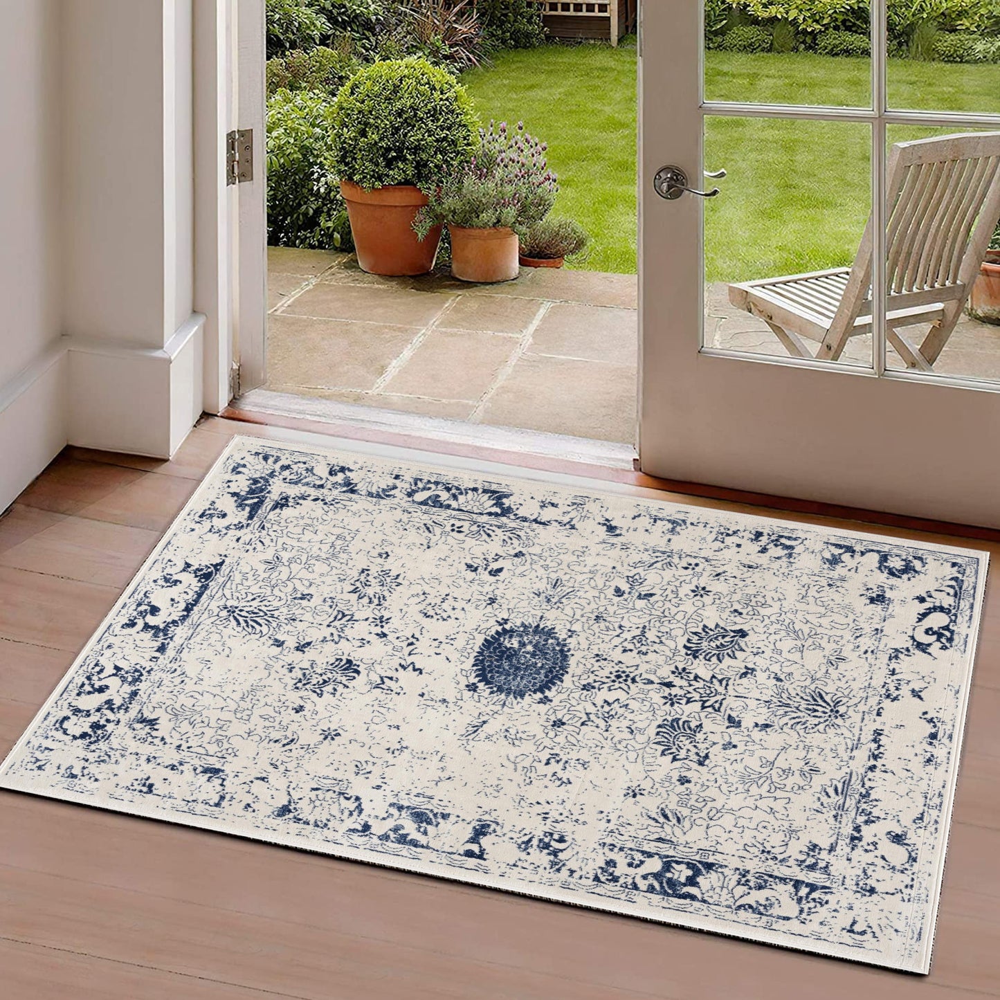 5’ X 8’ Navy Blue Distressed Floral Area Rug