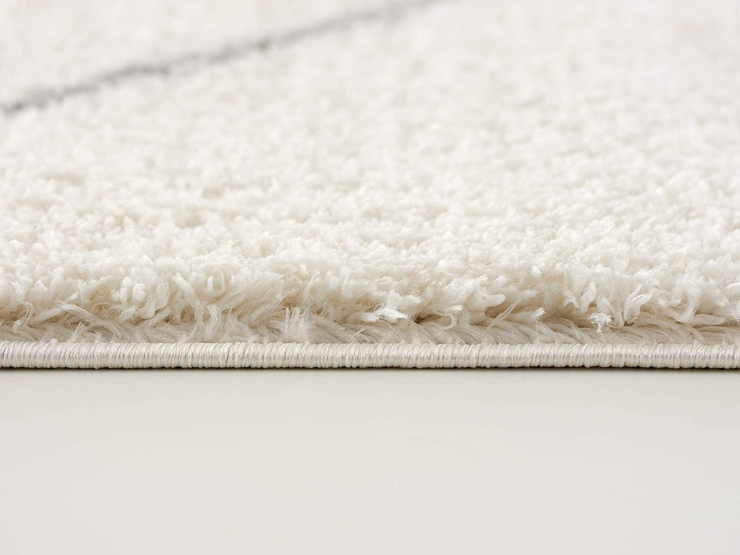 7’ X 9’ Ivory Modern Uneven Lattice Area Rug