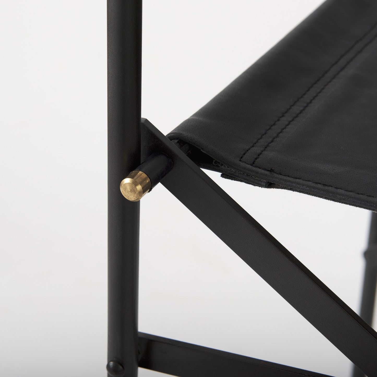 40" Brown And Black Leather And Iron Bar Chair With Footrest