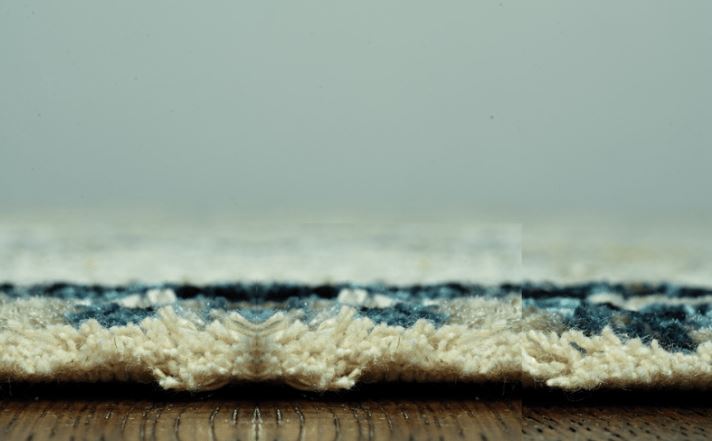 9' X 13' Blue And Ivory Abstract Dhurrie Area Rug