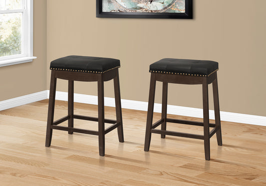 Set Of Two 25" Black And Espresso Faux Leather And Solid Wood Backless Counter Height Bar Chairs With Footrest