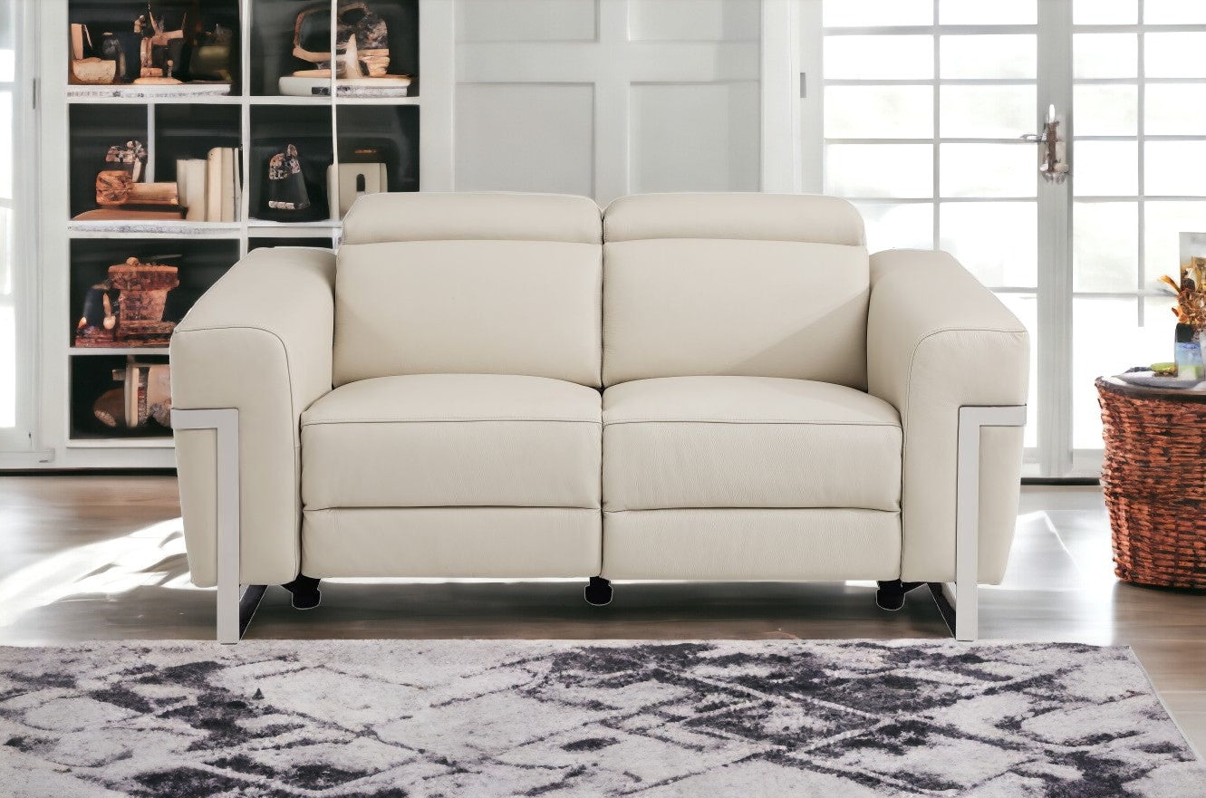 65" Beige And Silver Italian Leather Power Reclining Love Seat