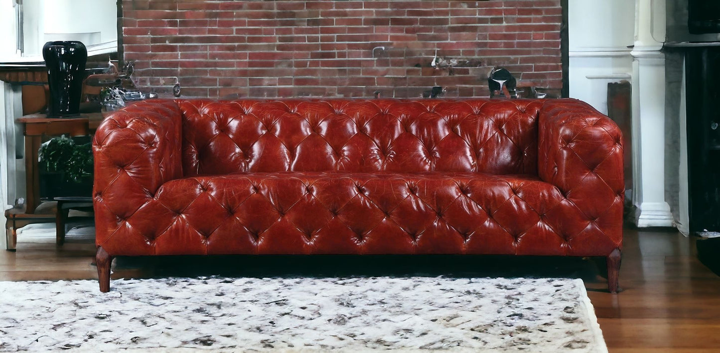 85" Merlot Top Grain Leather And Black Sofa