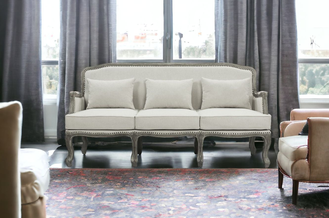 76" Cream Linen And Brown Sofa