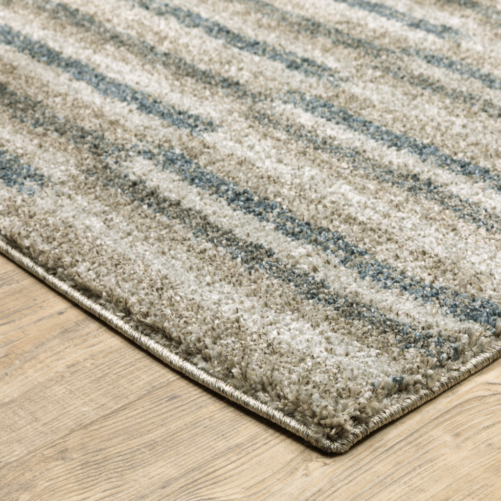 10' X 13' Teal Blue Grey And Tan Geometric Power Loom Stain Resistant Area Rug