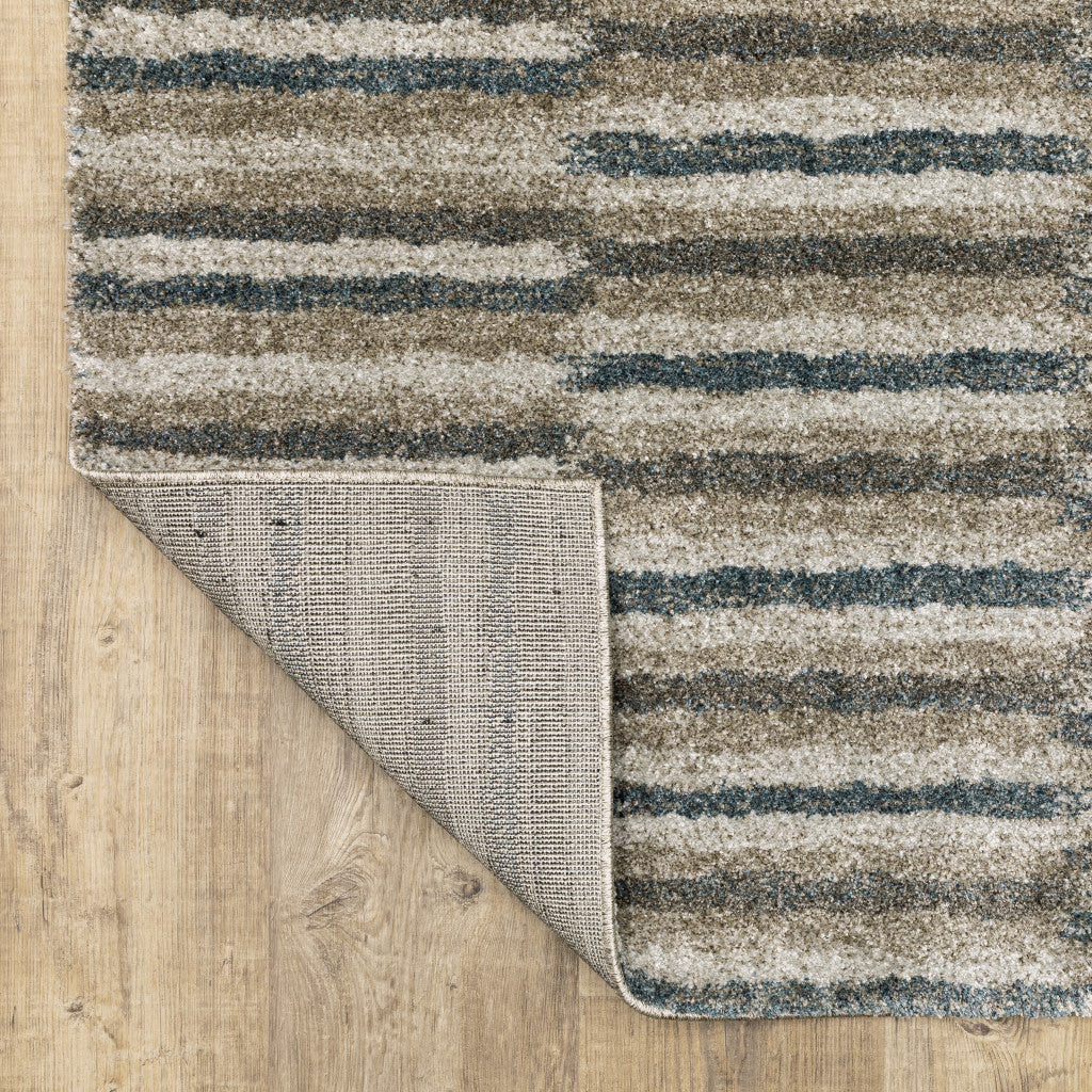 10' X 13' Teal Blue Grey And Tan Geometric Power Loom Stain Resistant Area Rug