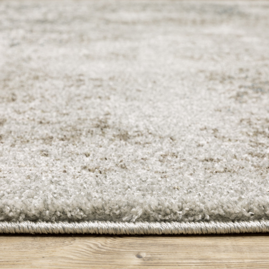 8' X 11' Grey Beige And Teal Oriental Power Loom Stain Resistant Area Rug