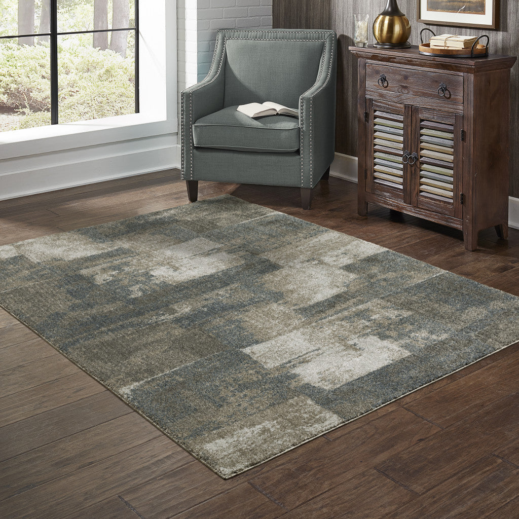 3' X 5' Teal Blue Grey Tan And Beige Geometric Power Loom Stain Resistant Area Rug