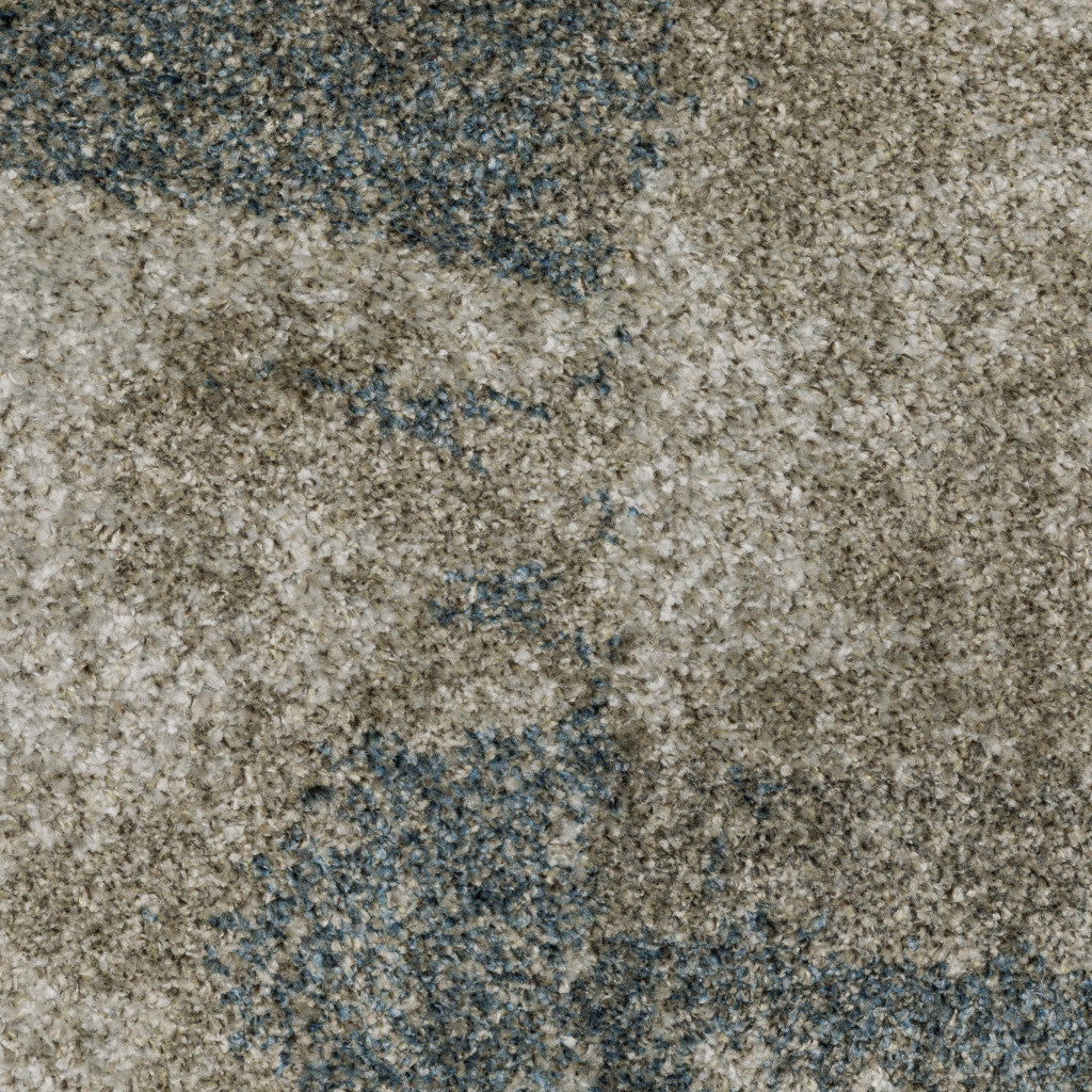 10' X 13' Teal Blue Grey Tan And Beige Geometric Power Loom Stain Resistant Area Rug