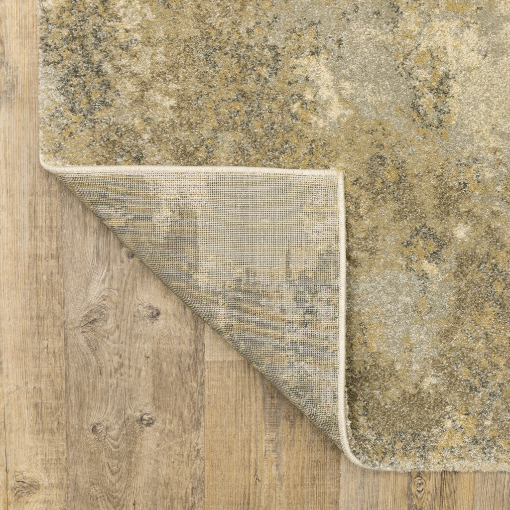 10' x 13' Beige and Gold Abstract Power Loom Area Rug