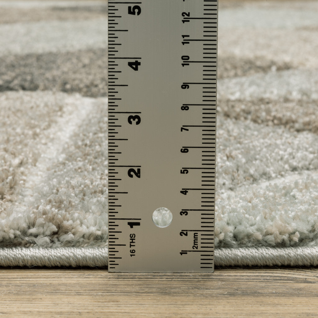 6' X 9' Grey Brown Beige Tan Taupe And Ivory Geometric Power Loom Stain Resistant Area Rug