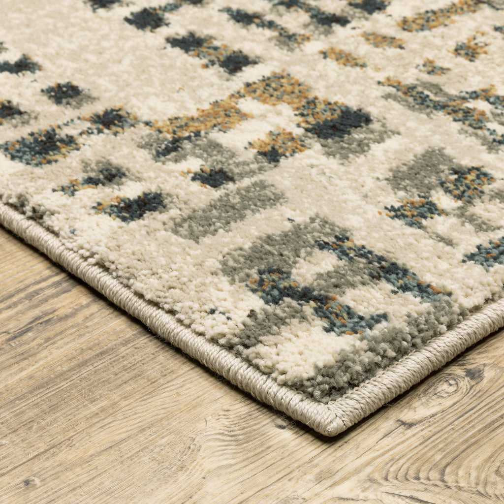 6' X 9' Beige Grey Blues Orange Yellow And Ivory Abstract Power Loom Stain Resistant Area Rug