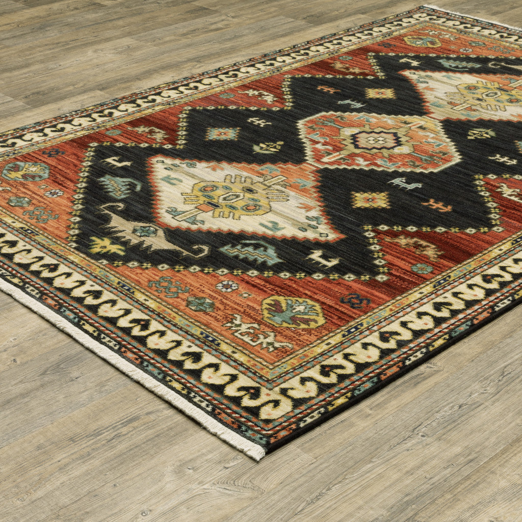 2' X 3' Charcoal Brown Orange Salmon Gold Navy Ivory And Pale Blue Oriental Power Loom Stain Resistant Area Rug With Fringe