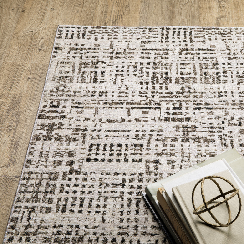 6' X 9' Ivory Grey Charcoal Brown And Beige Abstract Power Loom Stain Resistant Area Rug