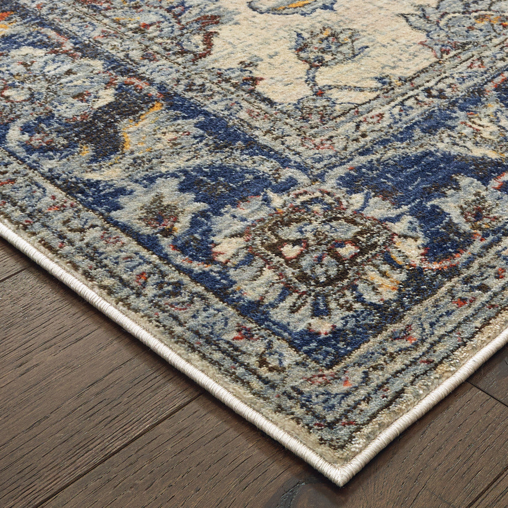6' X 9' Ivory And Blue Oriental Power Loom Stain Resistant Area Rug