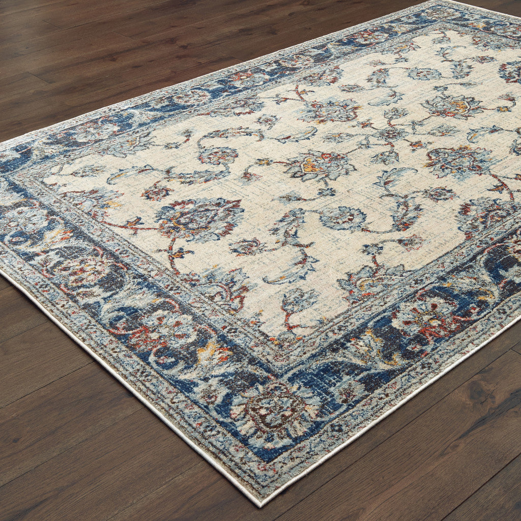 6' X 9' Ivory And Blue Oriental Power Loom Stain Resistant Area Rug