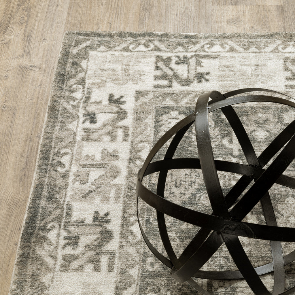 2' X 8' Grey Ivory Tan And Beige Oriental Power Loom Stain Resistant Runner Rug