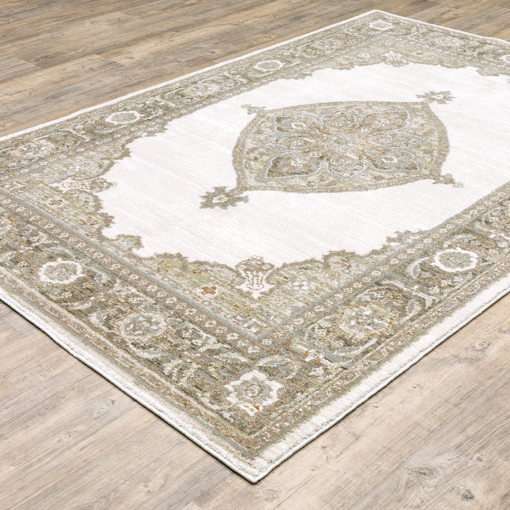 6' X 9' Beige Ivory Tan Gold Grey And Green Oriental Power Loom Stain Resistant Area Rug