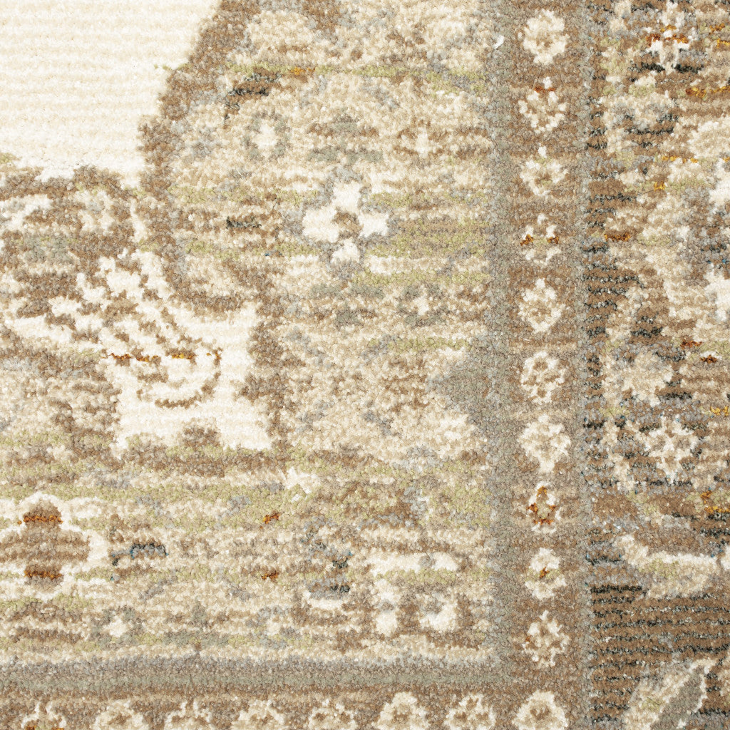 6' X 9' Beige Ivory Tan Gold Grey And Green Oriental Power Loom Stain Resistant Area Rug