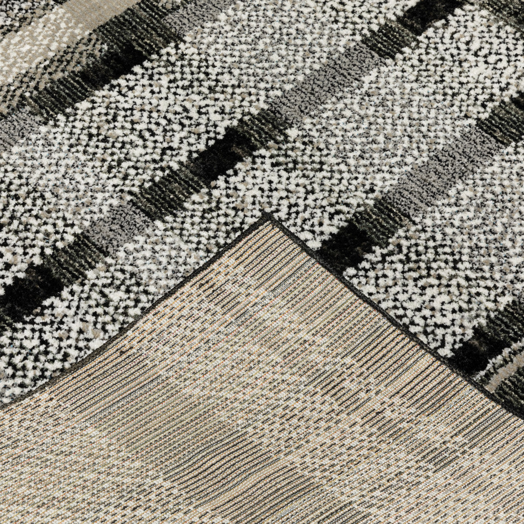 10' X 13' Black Grey And Ivory Geometric Power Loom Stain Resistant Area Rug