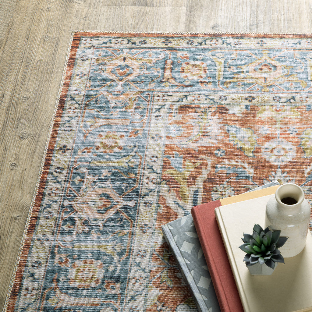 7' X 10' Rust Blue Ivory And Gold Oriental Printed Stain Resistant Non Skid Area Rug