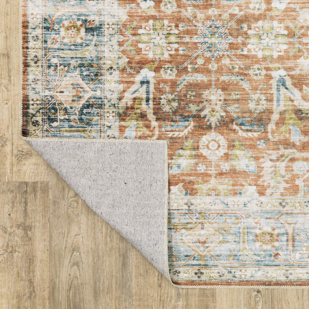 7' X 10' Rust Blue Ivory And Gold Oriental Printed Stain Resistant Non Skid Area Rug