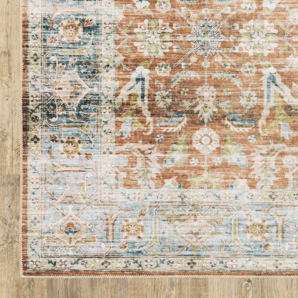 7' X 10' Rust Blue Ivory And Gold Oriental Printed Stain Resistant Non Skid Area Rug
