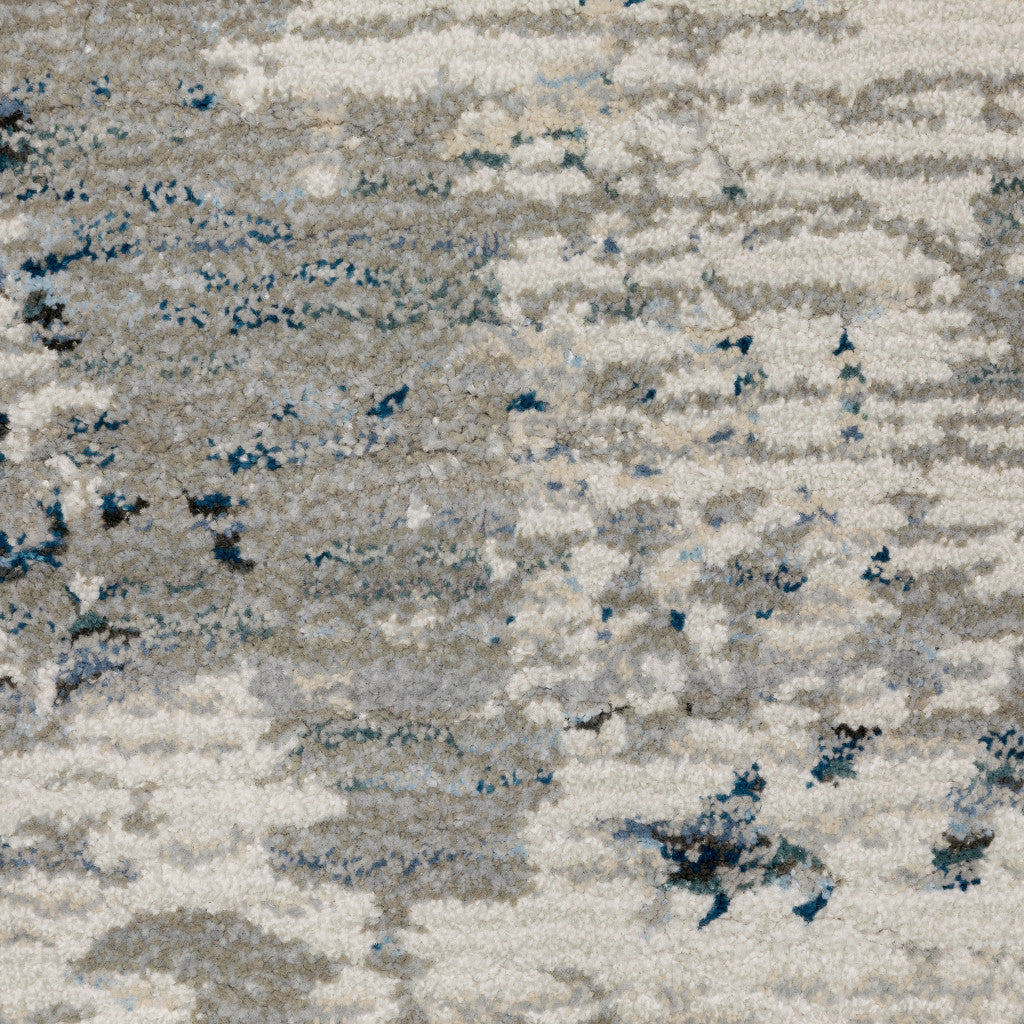 10' X 13' Blue Beige And Teal Abstract Power Loom Stain Resistant Area Rug