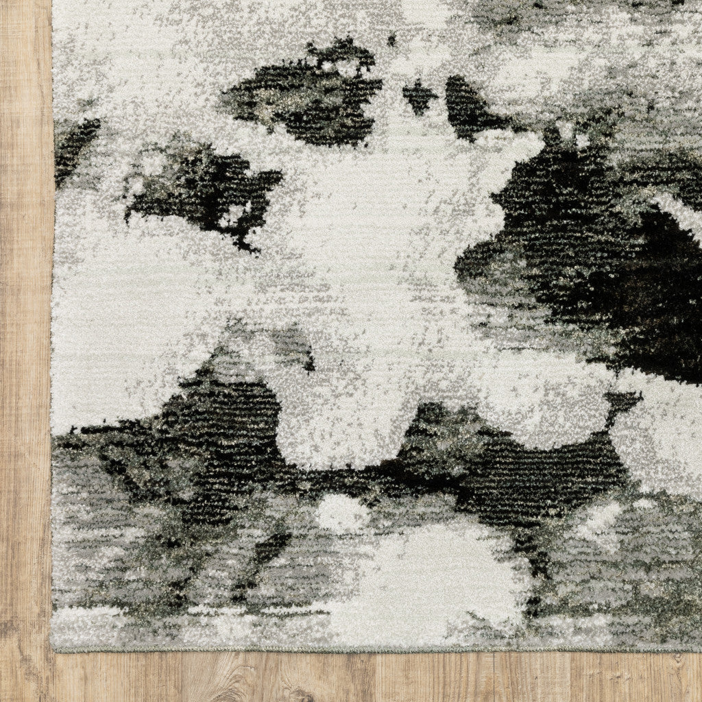 2' X 10' Charcoal And White Abstract Power Loom Stain Resistant Runner Rug