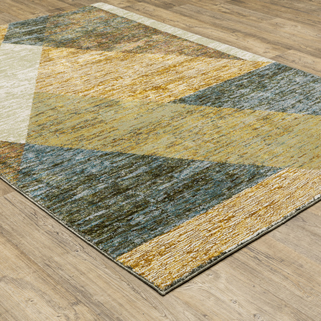 5' X 7' Gold Blue Green Rust Beige Purple And Teal Geometric Power Loom Stain Resistant Area Rug