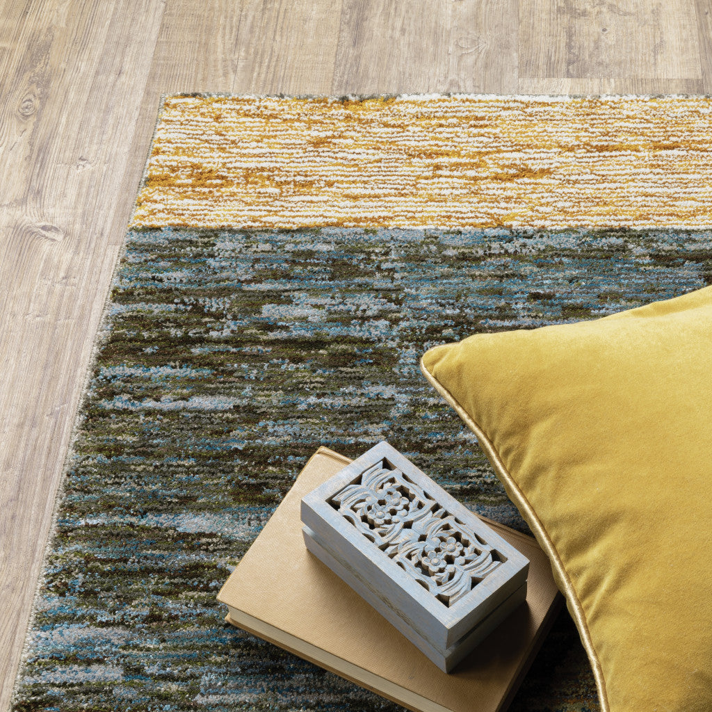 5' X 7' Gold Blue Green Rust Beige Purple And Teal Geometric Power Loom Stain Resistant Area Rug