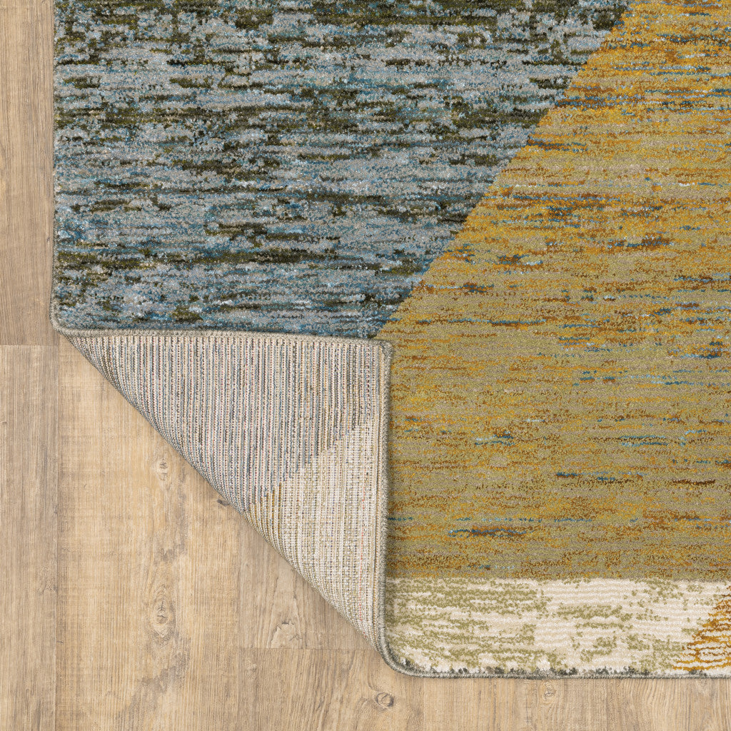 5' X 7' Gold Blue Green Rust Beige Purple And Teal Geometric Power Loom Stain Resistant Area Rug