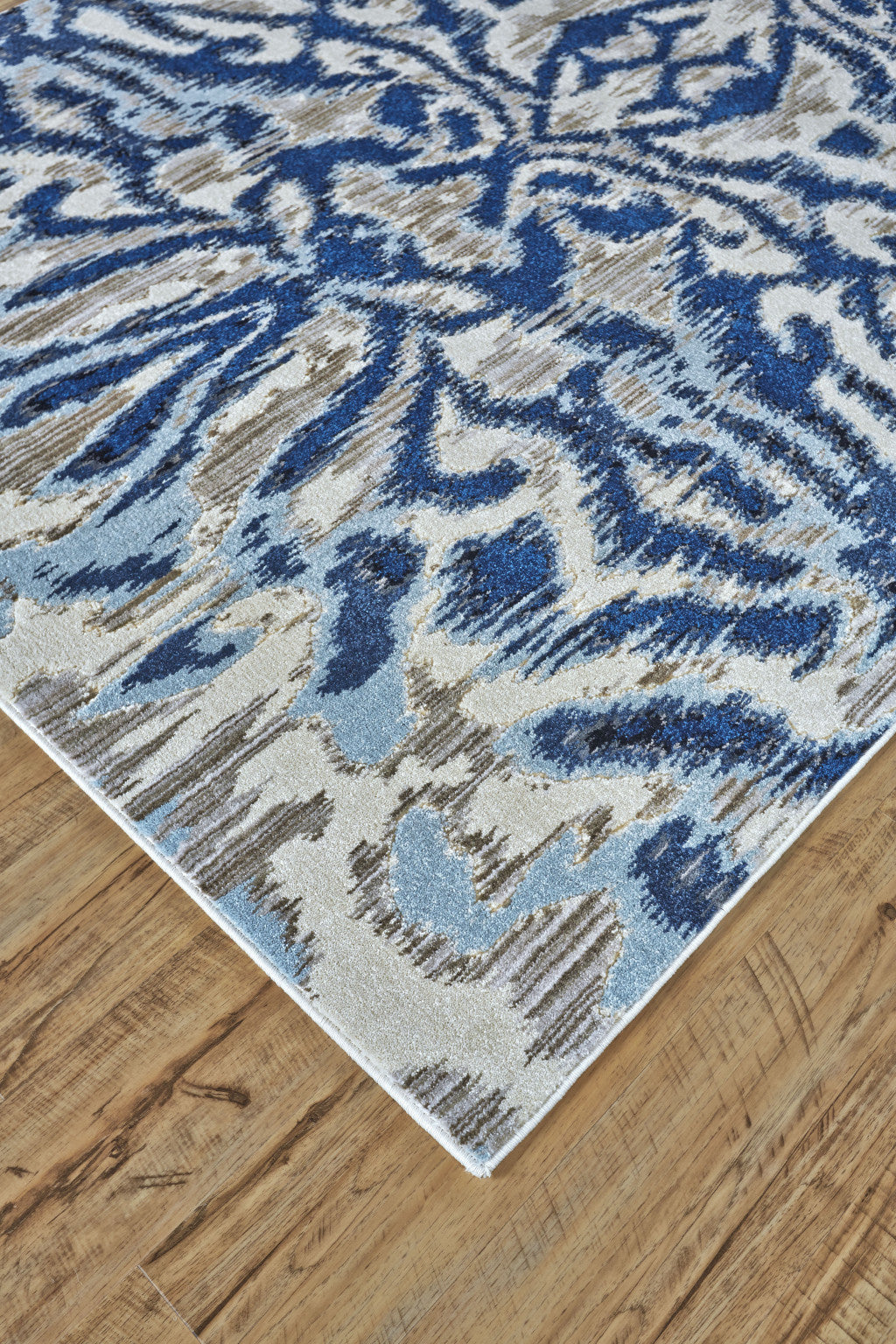 2' X 4' Blue Taupe And Ivory Ikat Distressed Area Rug