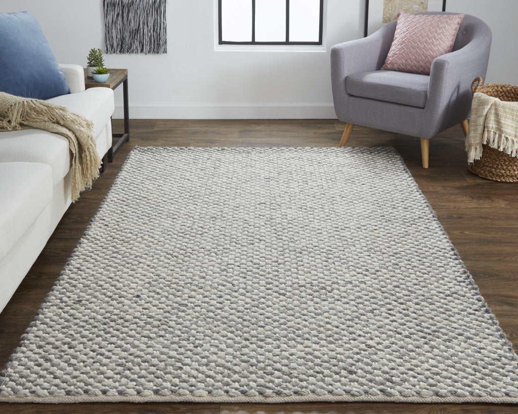 4' X 6' Gray And Ivory Wool Floral Hand Woven Stain Resistant Area Rug