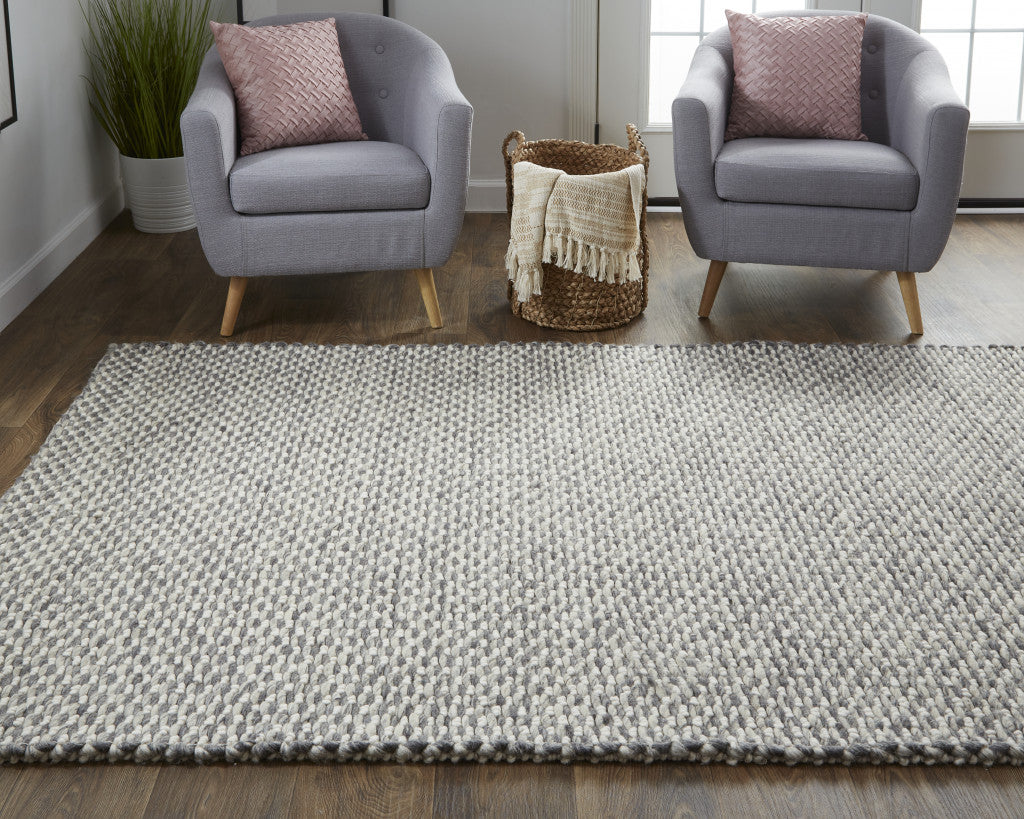 4' X 6' Gray And Ivory Wool Floral Hand Woven Stain Resistant Area Rug