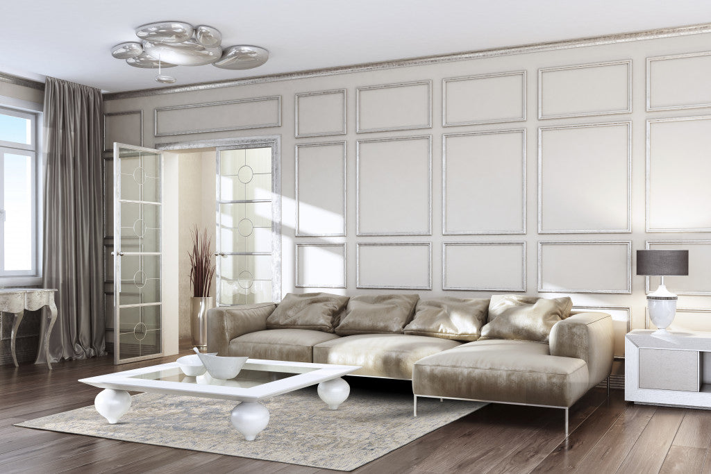 8' X 11' Ivory And Tan Abstract Hand Woven Area Rug